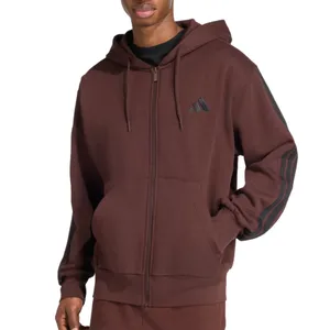 A brown zip-up hoodie with a drawstring hood and front pockets, featuring a small logo on the chest and striped detailing on the sleeves.