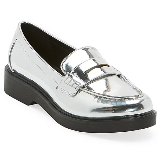 Silver metallic loafer with a penny strap and a chunky black sole.