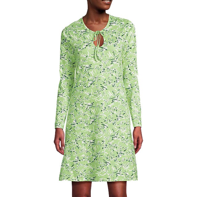 Green, long-sleeve cotton nightgown with a floral pattern, featuring a keyhole neckline with a tie closure.