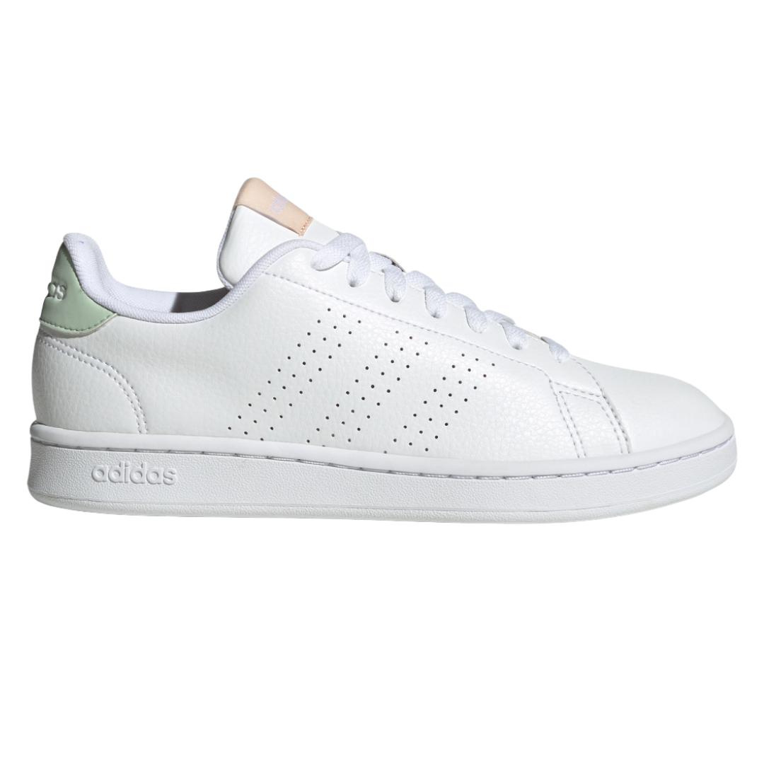 White Adidas sneaker with perforated stripes on the side, a beige tongue, and a mint green detail on the heel.