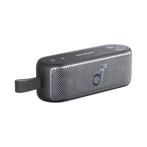 A black, portable Soundcore Bluetooth speaker with a metallic grille, control buttons on top, and a side strap for carrying.