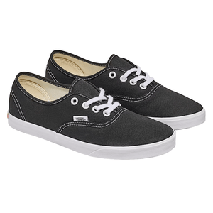 A pair of black Vans sneakers with white laces and soles, featuring visible stitching and the Vans logo on the side.