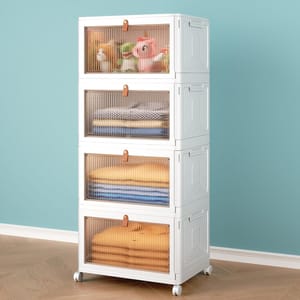 A white, four-tier storage unit with transparent doors on wheels, containing toys and folded clothes.