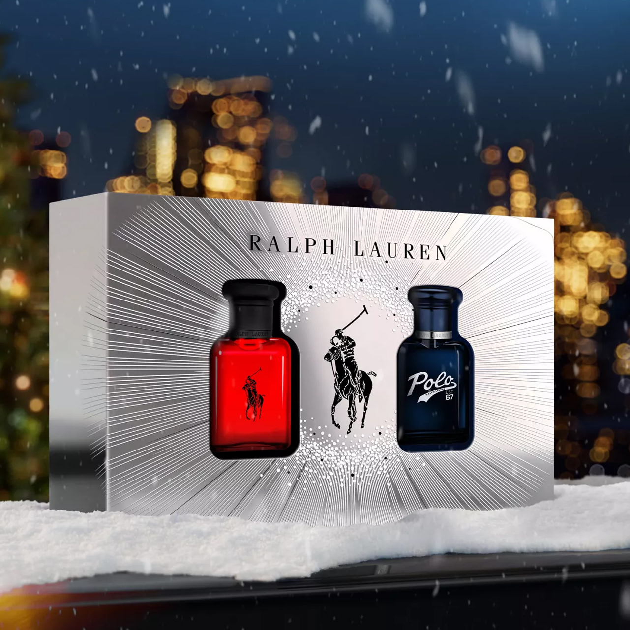 Ralph Lauren fragrance gift set with two bottles: one in red and one in blue, featuring the Polo logo with a snowflake-like design between them.