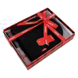 Levi's Scarf & Beanie Gift Set includes a black knit beanie and a gray scarf, packaged in a red and black striped box with a red Levi's ribbon.