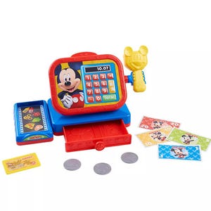 Toy cash register set featuring a cartoon theme with digital display, keypad, cash drawer, credit card, play money, and coins.