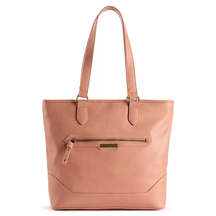 A pink leather tote bag with double straps and a front zipper pocket, featuring gold-tone hardware.