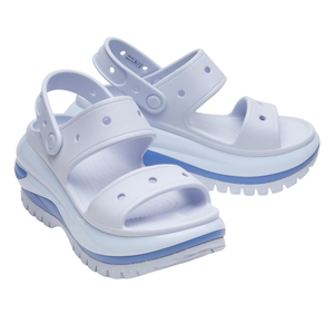 Lavender platform sandals featuring perforated straps, adjustable back straps, and a thick, textured sole in white and blue.