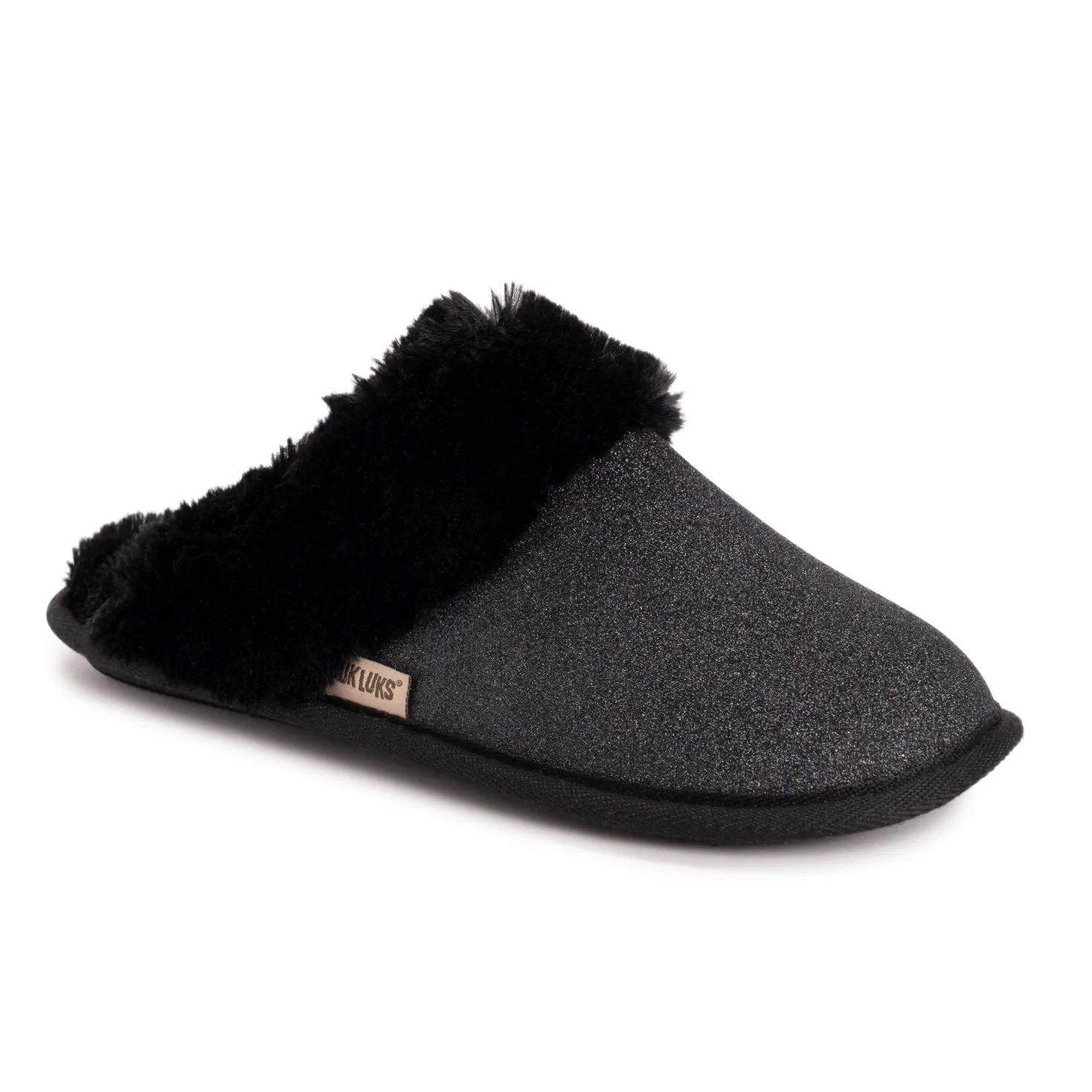 Muk Luks Sparkle Slippers feature a glittery black exterior with a plush, black faux fur lining and trim for comfort. They have a slip-on design with a low-profile sole.