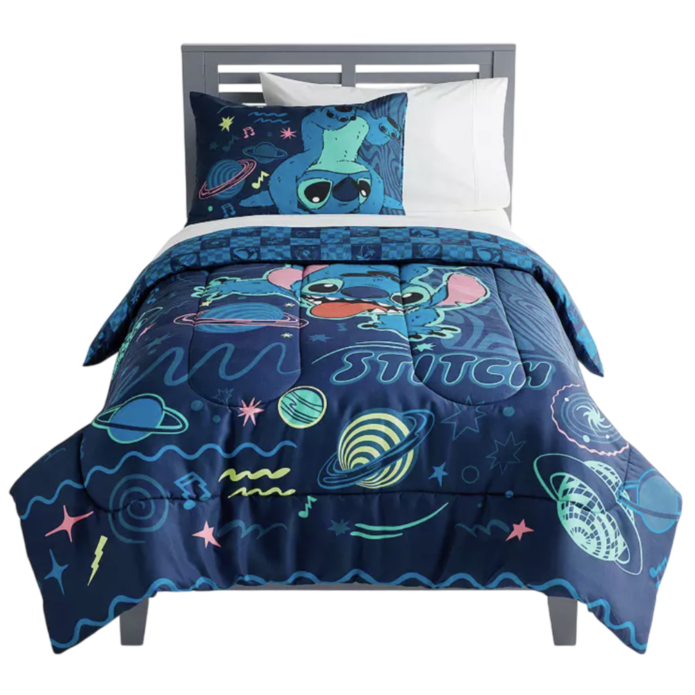 A twin bed set featuring Stitch from Disney's \“Lilo & Stitch,\“ with a blue space-themed design on the comforter and pillowcase, showcasing planets and stars.
