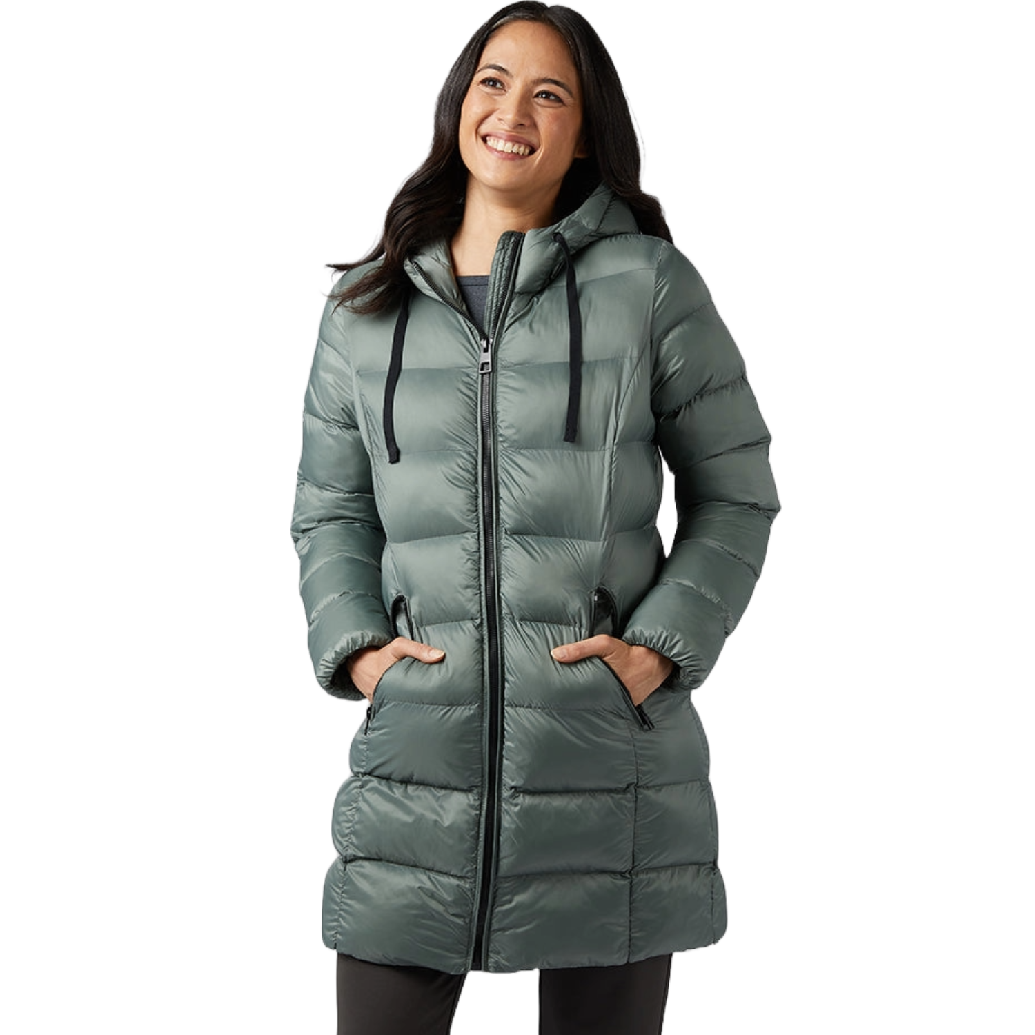A woman smiling and wearing a green hooded puffer coat with a zipper front and side pockets.