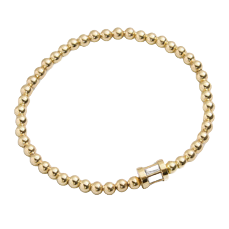 A gold beaded bracelet featuring a small, central rectangular stone, known as the Tatum Birthstone Bracelet.