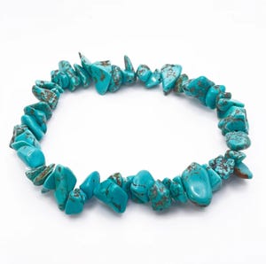 Turquoise-colored, irregular-shaped bead bracelet.