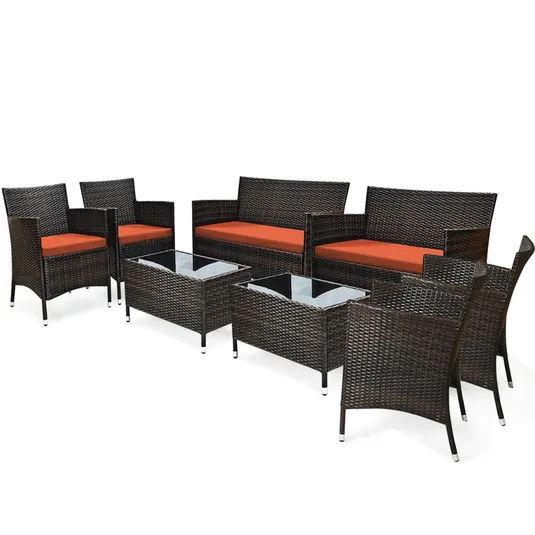 Outdoor patio furniture set including four chairs, two loveseats, and two glass-top coffee tables in dark wicker with orange cushions.