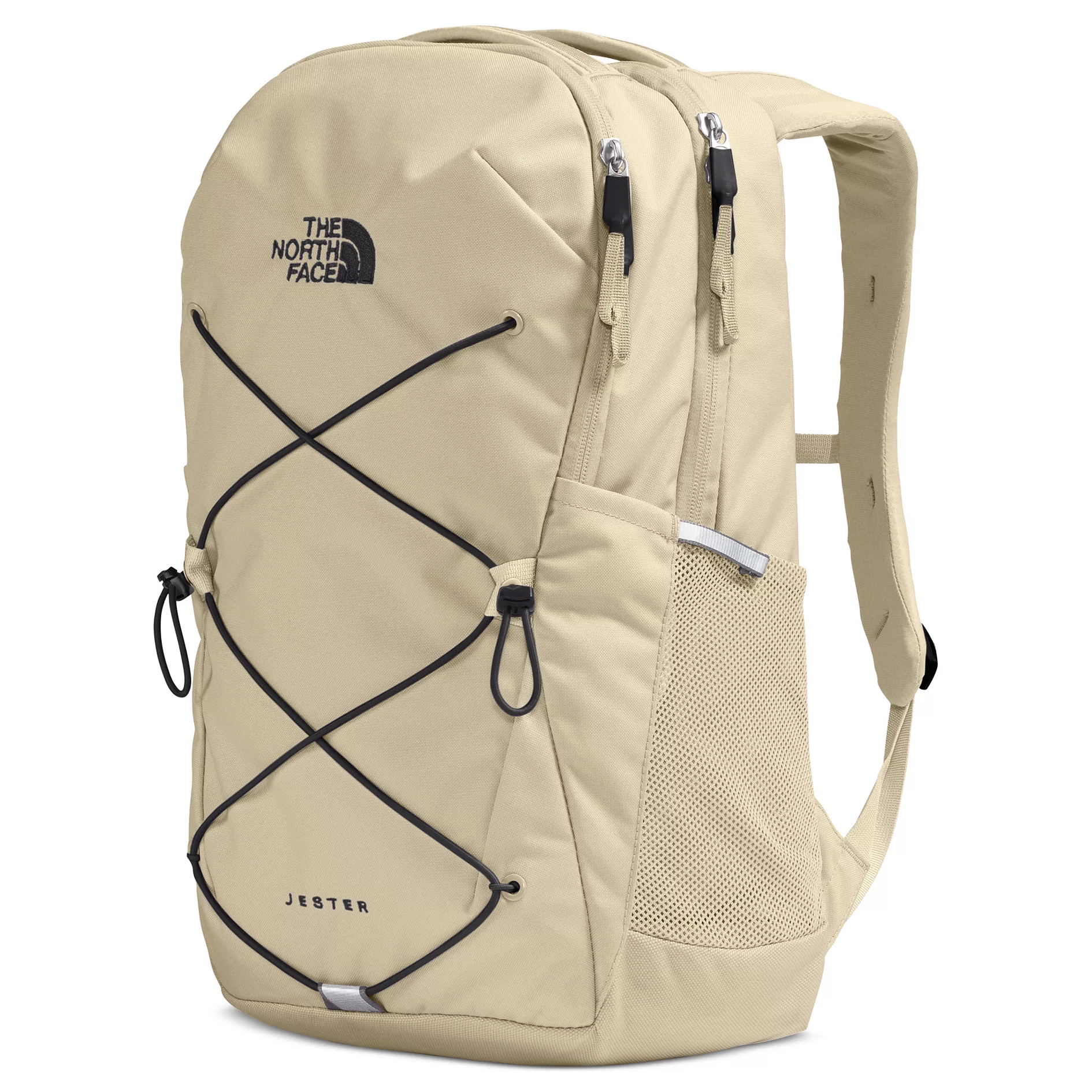 A beige North Face Jester backpack featuring dual zippers, black bungee cords on the front, a mesh side pocket, and padded shoulder straps.