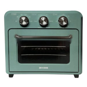 Green 17qt air fryer oven with three dials for temperature, function, and timer settings. Features options like air fry, bake, toast, broil, roast, and reheat, and has a see-through door with a handle.