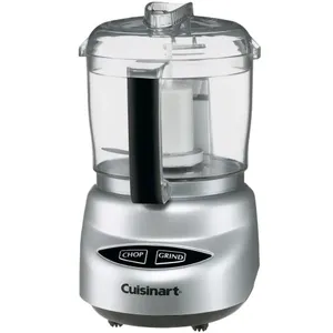 Cuisinart Mini-Prep Plus food processor with two control buttons labeled \“Chop\“ and \“Grind,\“ featuring a silver base and a clear bowl with a black handle.