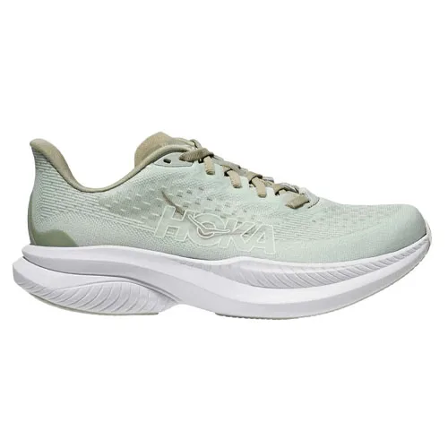 A light green Hoka running shoe with a cushioned sole, designed for comfort and performance.