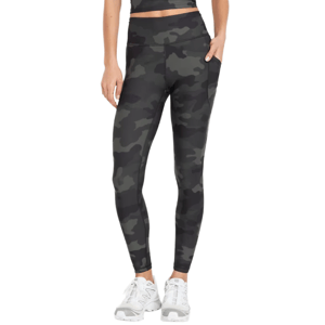 High-waisted, black camo-print leggings with side pockets, paired with white athletic shoes.