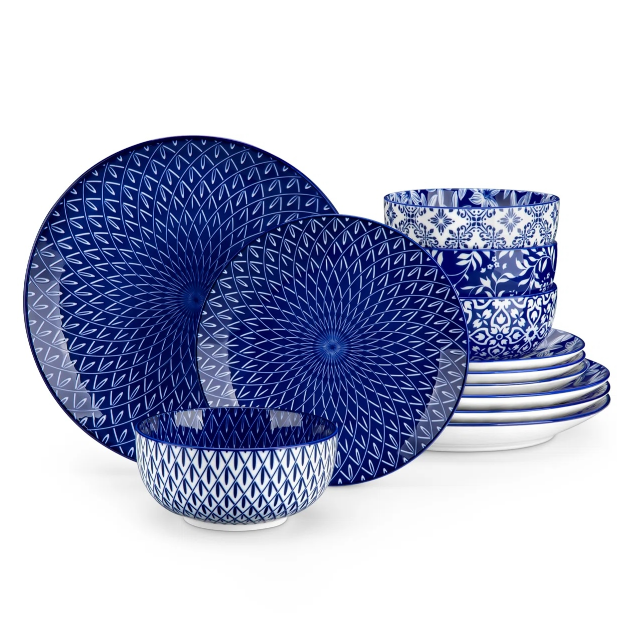 A dinnerware set featuring blue plates and bowls with intricate geometric and floral patterns.