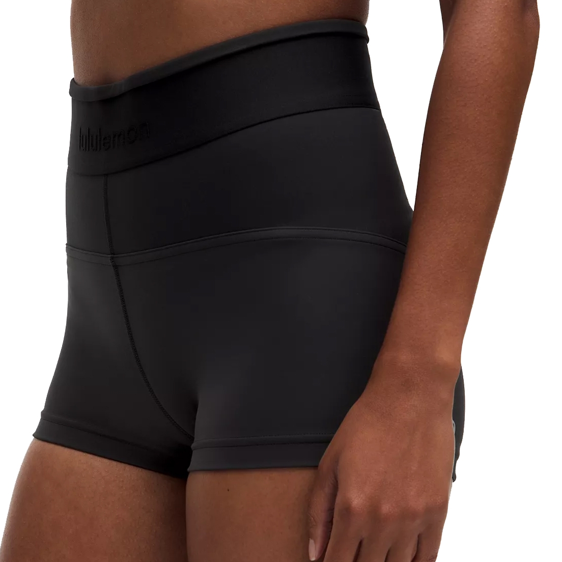 Lululemon License to Train Shorts are high-waisted, black, fitted shorts designed for flexibility and movement. They feature a seamless waistband for comfort, and the material is smooth and snug, suitable for athletic activities.
