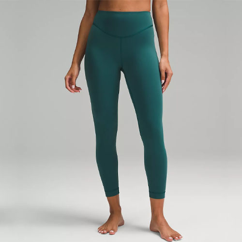 A pair of teal-colored, high-waisted leggings.