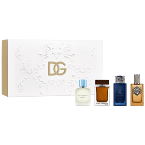 Dolce & Gabbana fragrance gift set featuring four scents: Light Blue, The One, K, and another distinctive perfume with a heart design on the bottle. The set includes a decorative box with the DG logo.