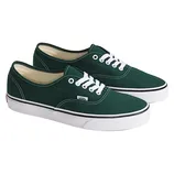 A pair of green Vans sneakers with white laces, featuring white stitching on the canvas upper and a white rubber sole with a black stripe.