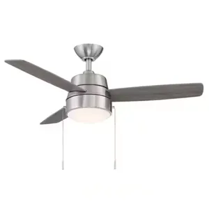 A modern ceiling fan with three blades, a central light fixture, and pull chains. The fan has a sleek, metallic finish.