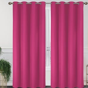 Two pink thermal blackout curtains are hanging on a rod against a white background, with a window and plants visible in the corners.