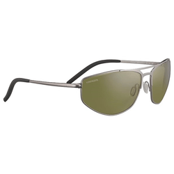 Sunglasses with a metal frame and green lenses, featuring black temple tips and adjustable nose pads. The brand name \“Serengeti\“ is visible on the lens.
