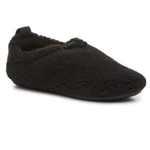 Black UGG Plushy Slippers with a textured, soft exterior resembling fleece or sherpa material, featuring a slip-on design and a small drawstring accent on top for added detail.