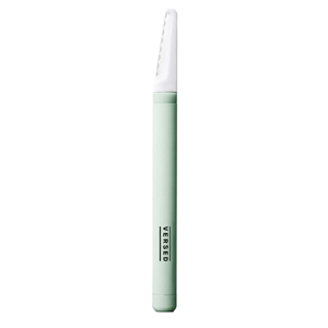 The Versed Dermaplaning Tool is a thin, mint-colored tool with a protective blade cover designed for exfoliating the skin by removing dead skin cells and fine facial hair.