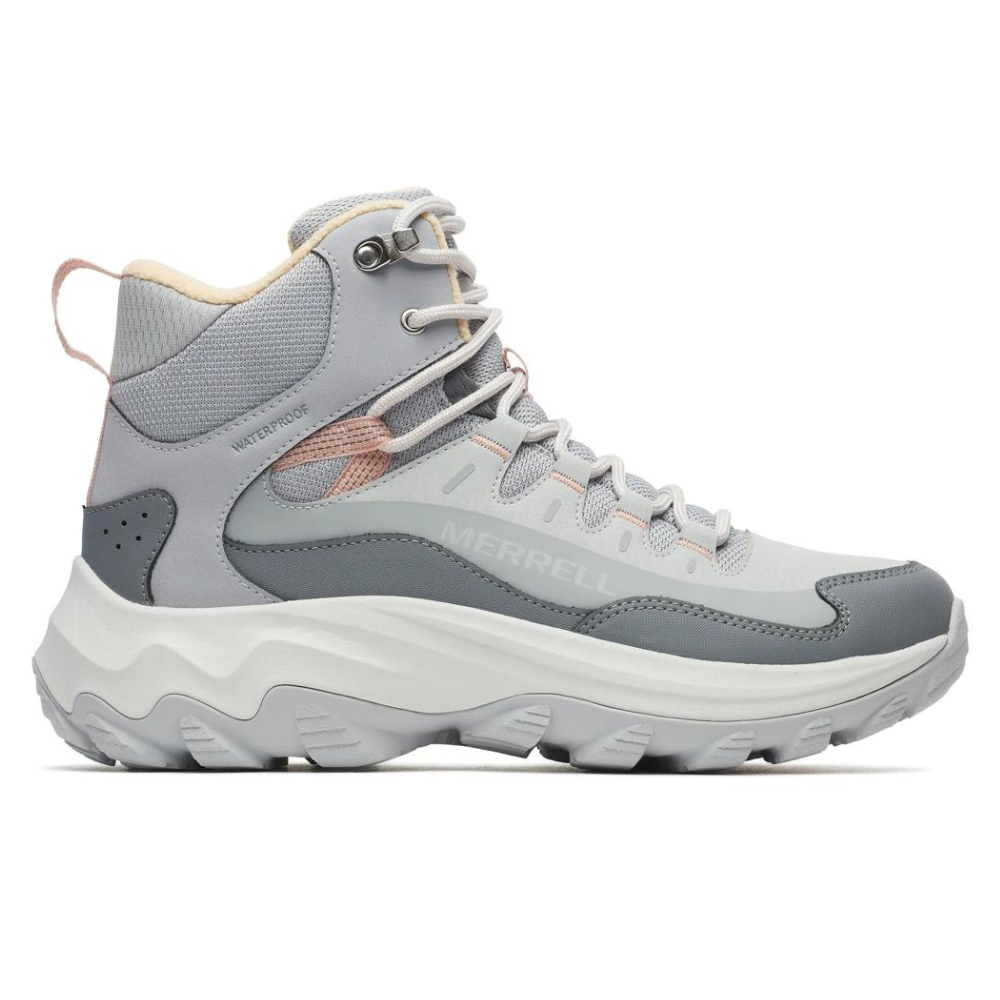 A gray waterproof hiking boot with high ankle support, featuring Merrell branding and a chunky white sole for traction.