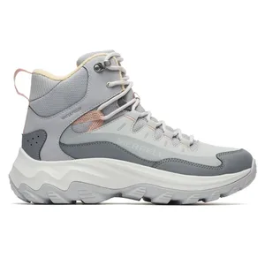 A gray waterproof hiking boot with high ankle support, featuring Merrell branding and a chunky white sole for traction.