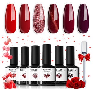 Modelones Nail Gel Polish Set includes six bottles of gel polish in various shades of red and purple, with both solid and glitter finishes. The set features a nail magnet tool and Valentine-themed decorations like hearts and roses.