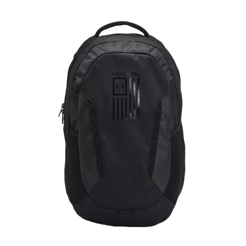 A black backpack featuring the Under Armour logo and the word \“FREEDOM\“ on the front. It has multiple compartments and side mesh pockets.