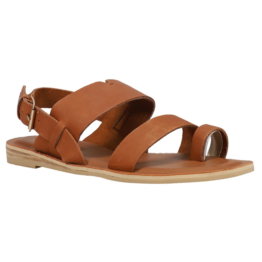 TOMS Freya Sling-Back Sandals feature a brown leather design with wide straps, an adjustable buckle closure, and a flat sole for casual comfort.
