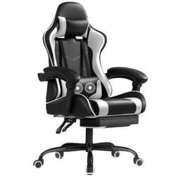 A black and gray gaming chair with adjustable armrests, a high back, a headrest pillow, a lumbar cushion, and a retractable footrest.