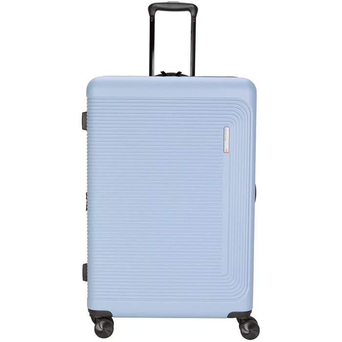 Light blue hard-shell suitcase with textured surface, retractable handle, and four spinner wheels.