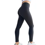 High-waisted black leggings paired with white sneakers.