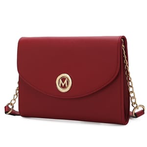 Red crossbody bag with a gold chain strap and a circular gold emblem featuring an \“M.\“