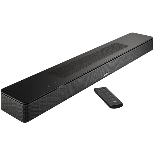 A black Bose soundbar and remote control are displayed, showcasing a sleek design with top and front speaker grills.