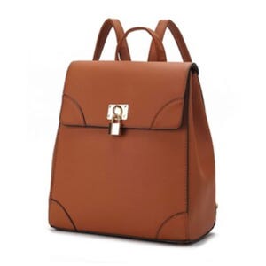 A brown leather backpack featuring a top flap with a gold lock closure, black trim accents, and adjustable shoulder straps.
