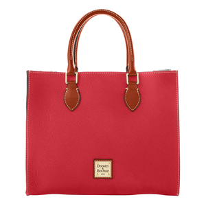 A red Dooney & Bourke tote bag with brown leather handles and white stitching, featuring the brand's logo on the front.