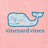 Pink background featuring the Vineyard Vines logo, a blue whale with a colorful coastal scene inside, and the text \“vineyard vines\“ below.