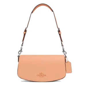 A peach-colored leather shoulder bag with a logo embossed on the front and a detachable metal chain strap.