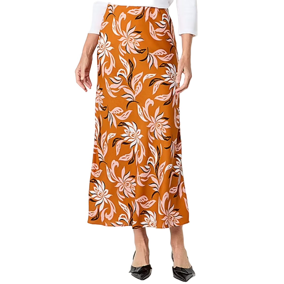 Liz Claiborne midi A-line skirt with an orange base and a pink floral pattern, featuring a flattering fit and ankle length. Paired with a white top and black pointed shoes.