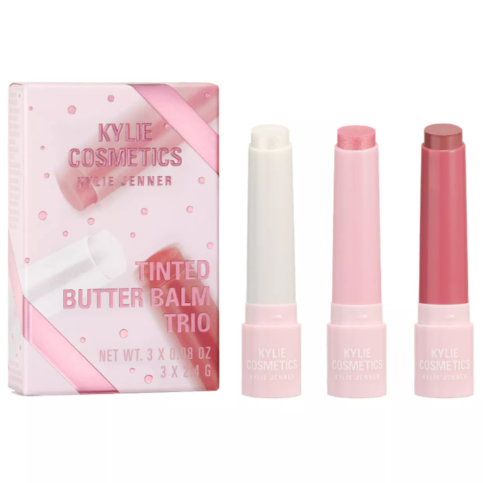Kylie Cosmetics Tinted Butter Balm Trio featuring three lip balms in varying shades, packaged in a pink-themed box.