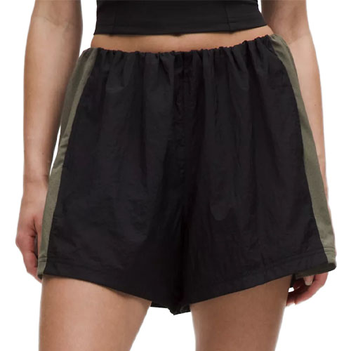 Black and olive colorblock athletic shorts with an elastic waistband.